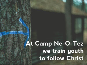 At Camp Ne-O-Tez we train youth to walk with Christ tree with arrow